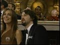 Gerard Butler and Jennifer Aniston presenting an award at the Golden Globes