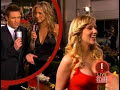 Is Ryan Seacrest Gay? u be the judge by the expression on his face.Also Scarlett's lucious boobs.