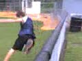 clears fence but falls