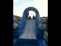 Riley jumping on slide