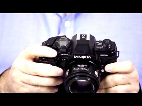 how to open a minolta x-370 camera