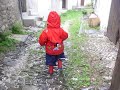 Little boy in the rain in Topolo. A one minute movie by cym.