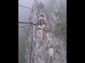 Atraversamento del ponte tibetano sul monte Grappa. Via ferrata Sass Brusai.