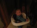 Brendan in the bouncy seat