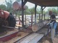 Sawing a Cedar Log