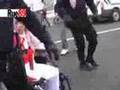 How did the Free Tibet protesters assault a DISABLED GIRL