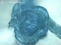 Shaving gel sprayed into a pan at high-speed