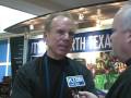 Roger Staubach talks with David Smoak at Super Bowl XLIII