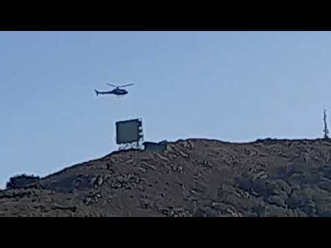Elicottero ispeziona i ripetitori sul Volterraio