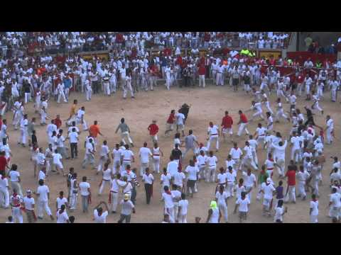 FAT NAKED MAN GORED BY A BULL PAMPALONA 2011 running of the bulls arena.