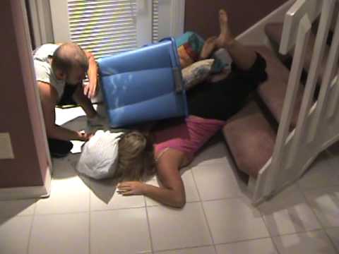 Girl sliding/falling down the stairs