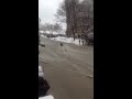 Video: Girl Walking Across Flooded Road Gets Washed Away