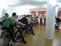 Judy's Spin class. About 20 people spinning hard.