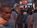 From http://vagabond-wanderer.blogspot.com,
On 21-10-2007 Dharmendra Tolani and Pankaj Kumar visited Har Ki Paudi in Haridwar and
attended the Ganga Aarti in the evening.
Since it was Vijayadashmi(Dashahara), there was a Shobhayatra ending at Har Ki Paudi as well(as you can see in the video, some idols
are brought for immersion).

Before the aarti begins, some workers request people to contribute money for maintaining Har Ki Paudi and everyday 
Aarti.

So this video is a preamble for Aarti,
main Aarti is in part - II. - Ganga Aarti - Har Ki Paudi - Haridwar - Part I