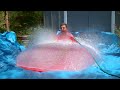 6ft Man in 6ft Giant Water Balloon - 4K - The Slow Mo Guys the