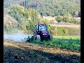 NewHolland M135 con erpice a dischi NARDI da 4m