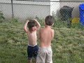 block party with some other children aged 3 and 5 years old. it was very hot that day so they took their shirts off. she had a great time running all day!!
