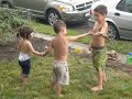 block party with some other children aged 3 and 5 years old. it was very hot that day so they took their shirts off. she had a great time running all day!!