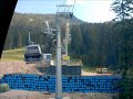 Alternanza di filmati e foto per ricostruire il viaggio da valle a monte(pasando per l'intermedia) sulla cabinovia del Doss Pelà, nella Skiarea della Paganella