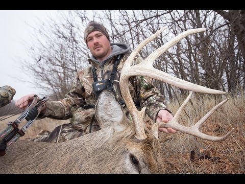 Hunting - Antler Geek Tony Hansen takes a Kansas whitetail with a bow while hunting from the ground without a blind.