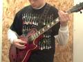 Gage playing guitar