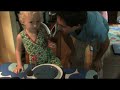 Noa taste testing dark amber and light maple syrup
