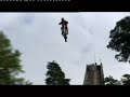 Motorcycle jump from skijumping hill.