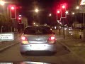 Driving along tram/train lines in road at night on A41 south wolverhampton eventually leading to tram level crossing