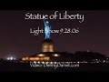 statue liberty light show ellis island lighting historical night dramatic