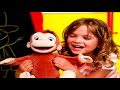 A commercial for the Curious George Tickle n' Giggle doll.