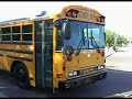Claire Marie Riding on A School Bus