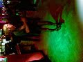 old man dancing in nightclub wearing...