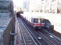 this is a film of the mbta subway train entering a tunnel on the red line after crossing the longfellow bridge from boston into cambridge, massachusetts, ma on the way to the kendall mit station stop from charles river mgh.