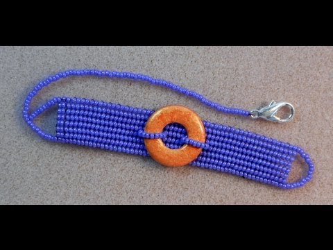 tsummerlee - Herringbone wrap bracelet is made using an 8 column herringbone strip with loops on either side to accomodate the