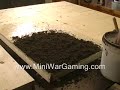 Click below to get your Warhammer terrain supplies: store.miniwargaming.com win a $100.00 gift certificate to our online Warhammer store by entering in our Warhammer painting tips contest! For full contest rules click the link below: www.miniwargaming.com Hey mini war gamers. This new video shows you step by step how to make a Warhammer gaming board. Stop by your local hardware store and pick up a sheet of 1/2 inch plywood. They usually come on 8'x4' sections so you may need them to cut the sheet in half. Buy four 8'long 1x2's for the framing. Cut them accordingly to fit underneath the plywood top. Watch the video and see the different steps. Next you apply watered down glue then your fine sand. Once dry apply acrylic paint to seal the sand particles. Also, here's the written article for making a warhammer gaming table: www.miniwargaming.com Subscribe to us and be the first to receive our terrain making videos! (less)