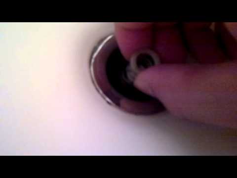 how to remove a bathroom sink stopper