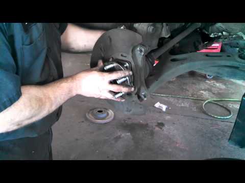 Front wheel bearing hub assembly Subaru Outback 2005 -2014 Legacy Install Remove Replace How to