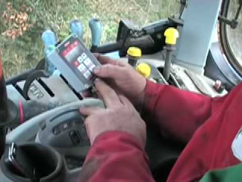 T7060 - new holland t7060 tractor and kuhn integra drill sowing spring barley 2010.