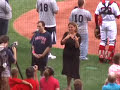 This man with autism, who was chosen to sing the national anthem, got a case of the giggles half way through. Listen to what the crowd does to support him.