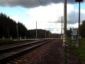 Windhoff track maintenance unit passing a unguarded level crossing...