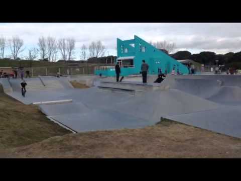 BMX Rider in Black Shirt Fails on Front Flip Attempt at Skatepark