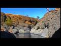 Me jumping from high part of cliff at Bear Hole Chico, CA