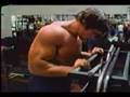 Arnold Pumping His Biceps