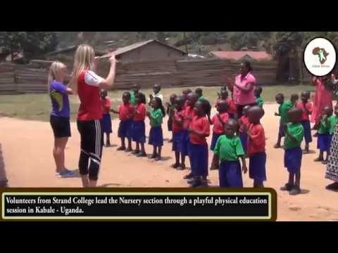 Volunteers from Strand College teaching the children how to dance and have fun Volunteers from Strand College teaching the children how to dance and have fun