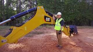 Learn the location of your Cat® backhoe loader's grease points.