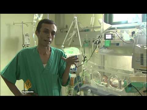 BABY - More than 30 houses in Gaza have been hit by airstrikes on Friday, while the death toll has reached over 860. But despite the growing number of deaths one unlikely survivor is a new born baby,...