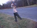 James drives a golfball