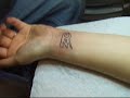 Elisa's Zico Chain Tattoo