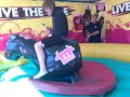booley riding a mechanical bull... funyn