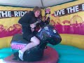 booley riding a mechanical bull... funyn